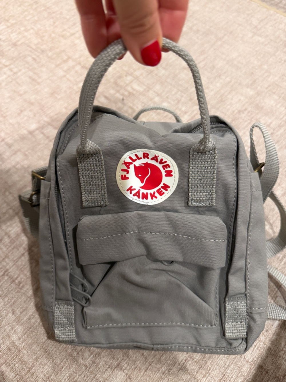 Fjallraven Kanken Mini Backpack in Gray with Red Logo